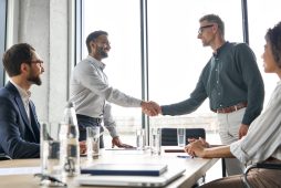 Two,Happy,Diverse,Professional,Business,Men,Executive,Leaders,Shaking,Hands